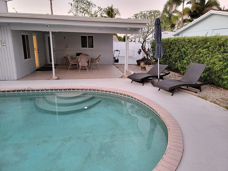 REAR COVERED PATIO & POOL