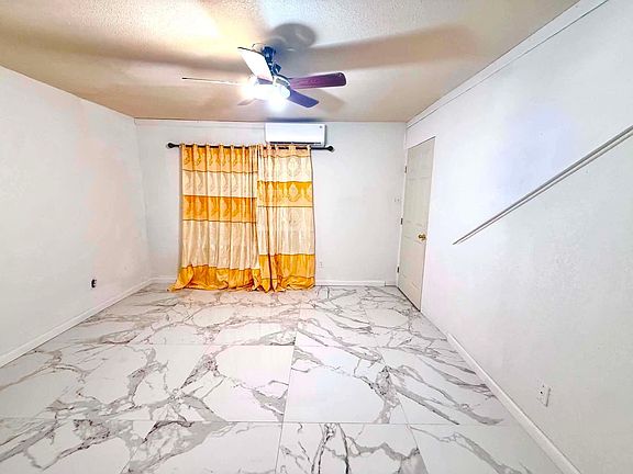 5th image of 11919 Beechnut St