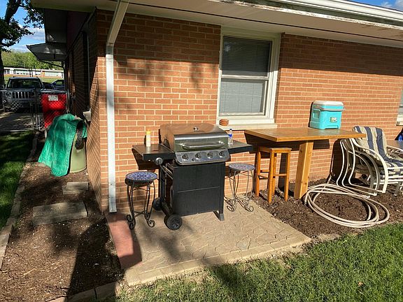 The patio pavers installed in two locations in 2020. The table is built in.