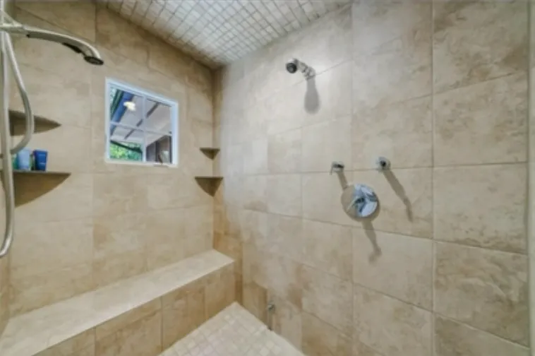 Primary bathroom features a modern steam shower