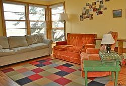 Bright living room with hardwood floors!