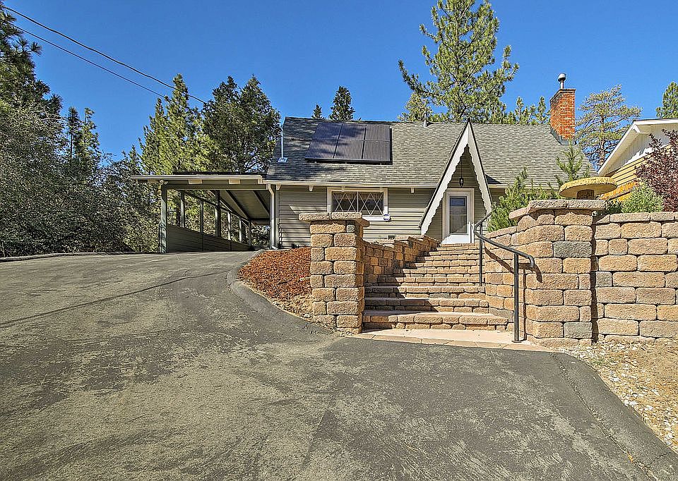 Cabin stairs/carport at left