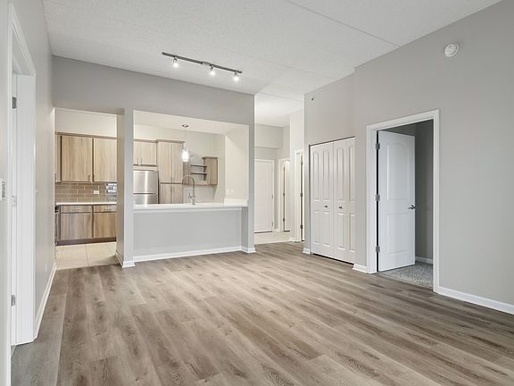 Spacious layout with wood-style flooring throughout