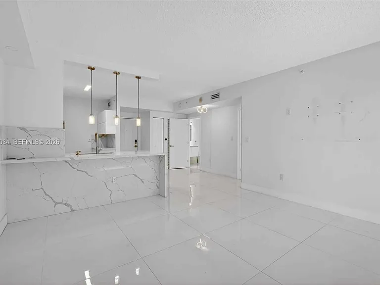 5077 NW 7th St — Photo 3