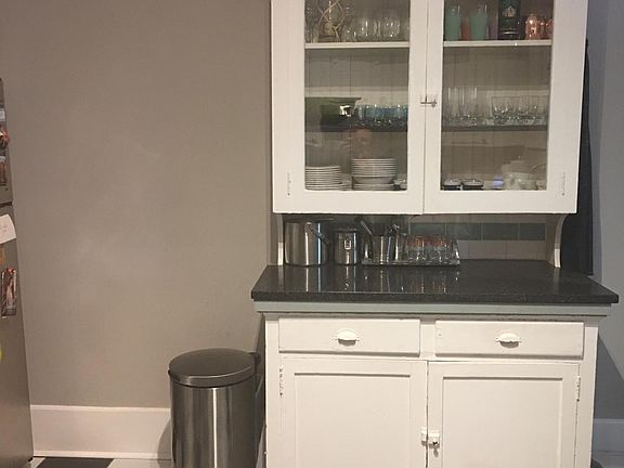 Adorable kitchen hutch.