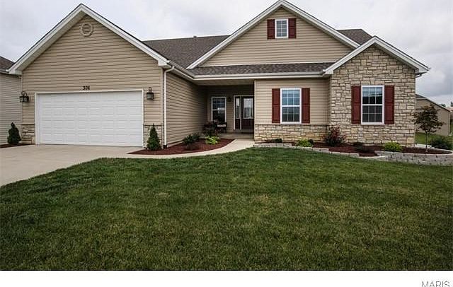 Beautiful family home with professional landscaping and mature yard