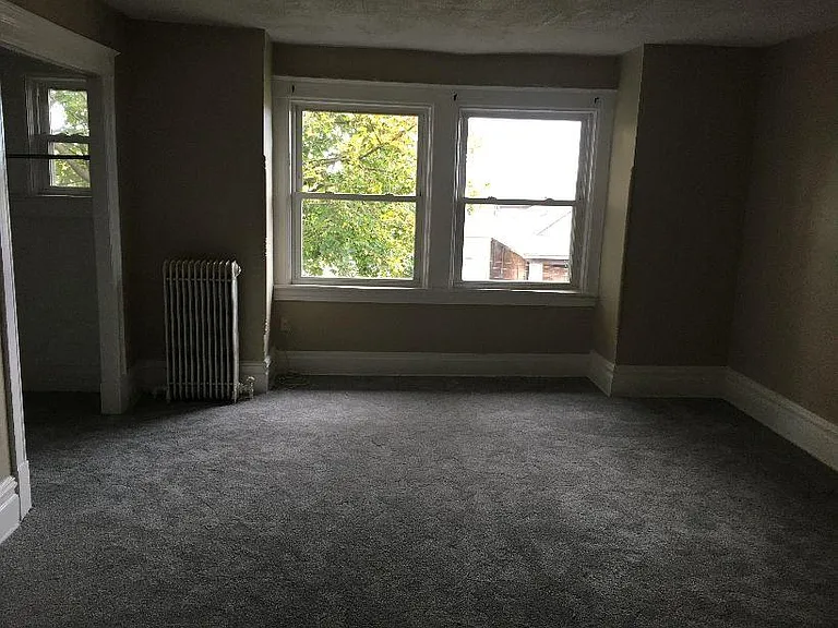 Front bedroom with walkin closet and laundry chute