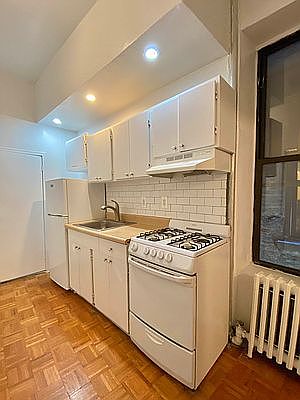 1st image of 228 W 25th St APT 1RE