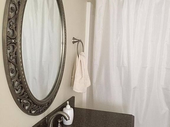 One of two master bathrooms