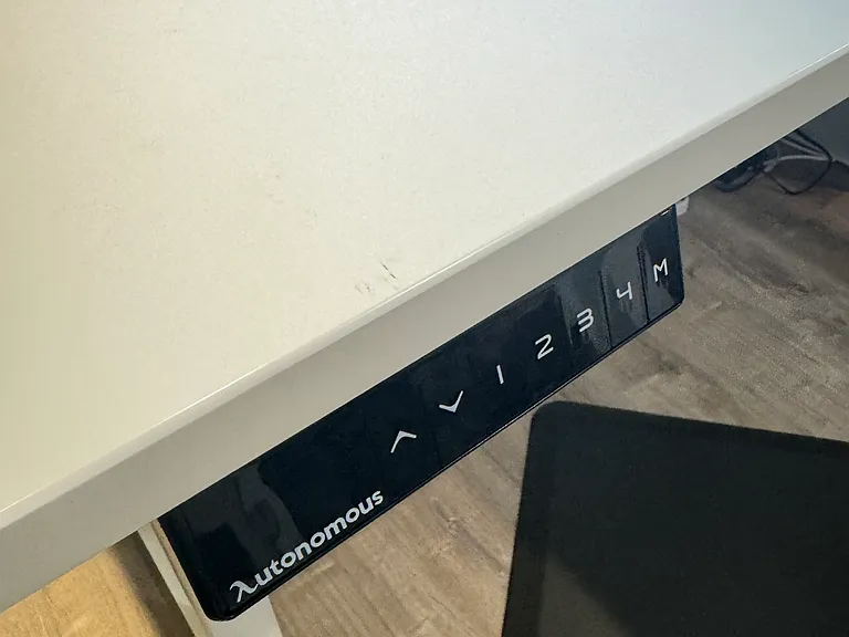 Motorized L-shape desk.