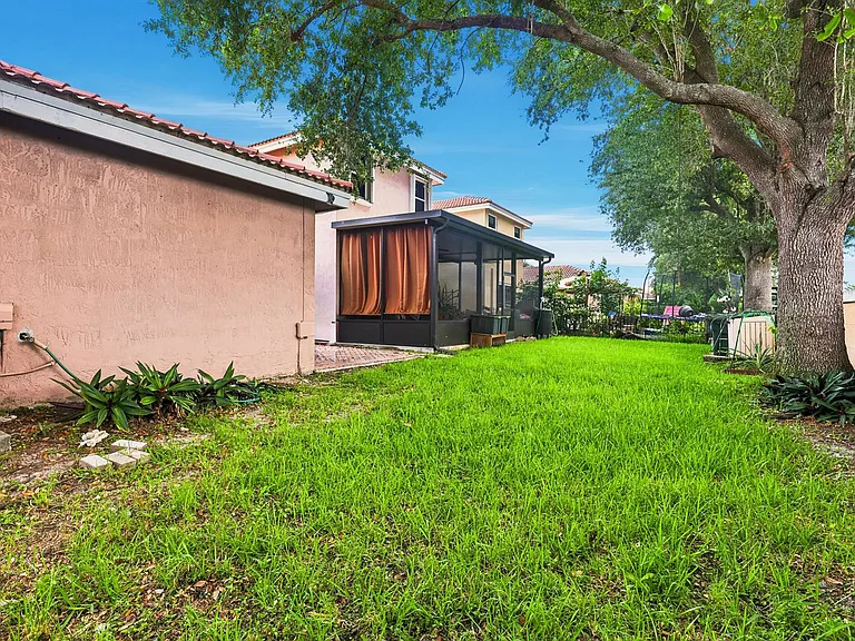 9312 NW 54th St — Photo 32