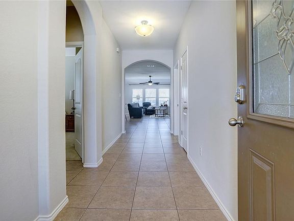 Foyer and hall leading to living area