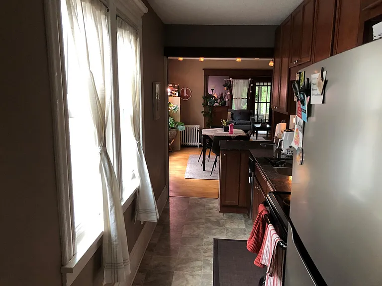 Kitchen through to the dining and living room.