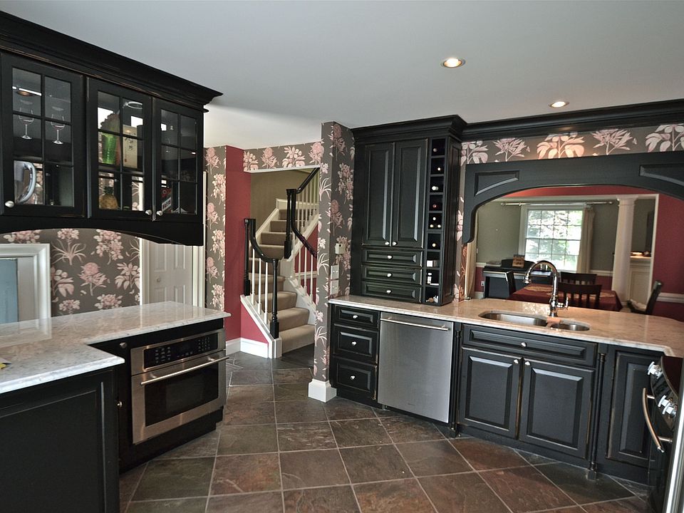 Custom Medallion cabinets with marble countertops