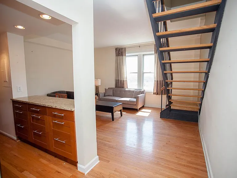 First floor wide angle showing open staircase to 2nd floor