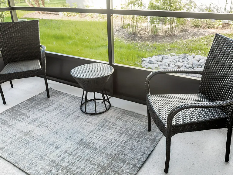 Screened-in patio for enjoying the outdoor air an extension of your home.