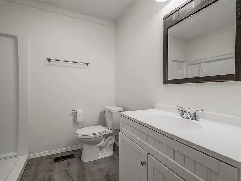 Shower on left, large vanity