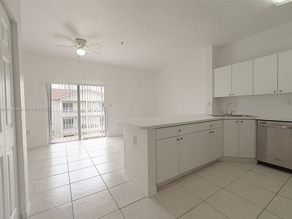 5th image of 6930 NW 179th St APT 407-8