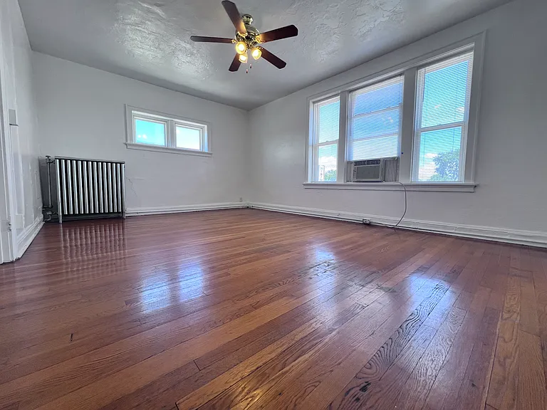 Allowing sunlight to pour into the living room, enhancing the open feel and welcoming ambiance of the home.