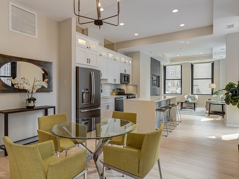Dining area + kitchen / center island + living