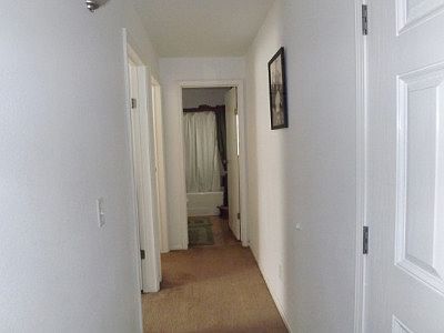 Split floor plan home, 2 bedrooms in the front part of this home and bathroom.