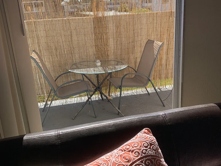 Patio door leads to Balcony