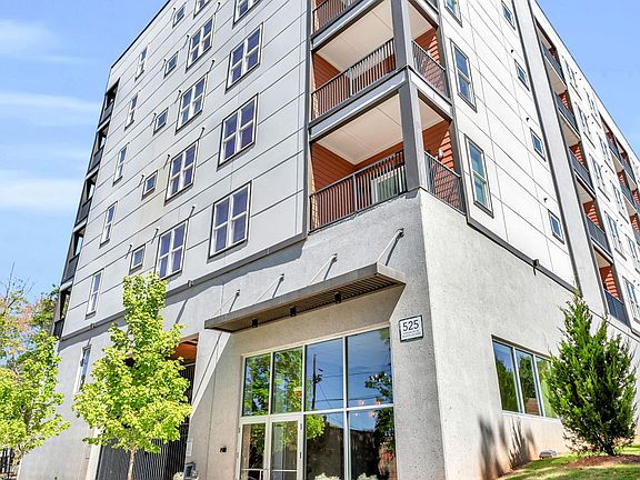 Each home features open layouts, 9-foot ceilings, private balconies, designer kitchens, and spa-inspired bathrooms.