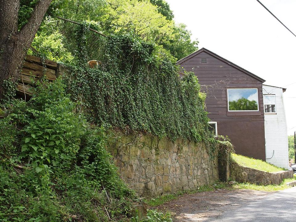 2 vehicle parking & upper yard fence