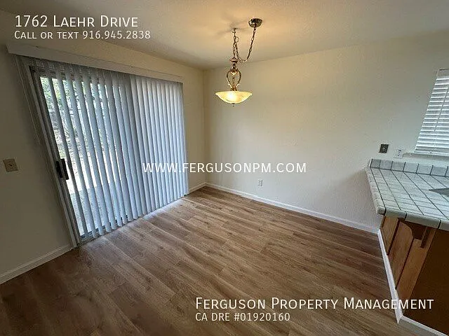 Three Bedroom Lincoln Home with New Paint and Flooring — Photo 4