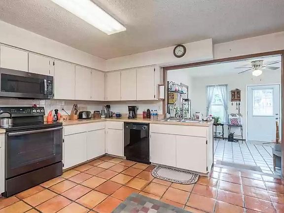 Large size kitchen adjoins the living room