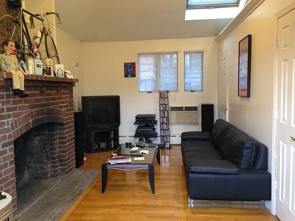 Large Living Room Hardwood floors Large AC unit Storage closet
