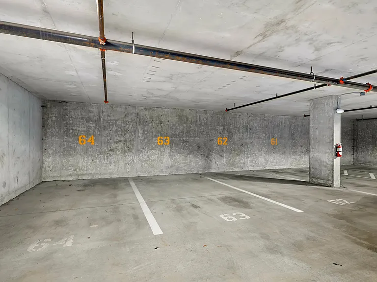 Assigned Parking Spaces #63 and #64