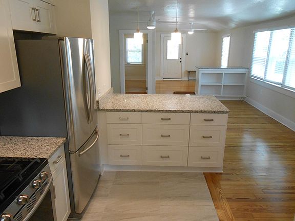 Plenty of storage, original heart of pine flooring