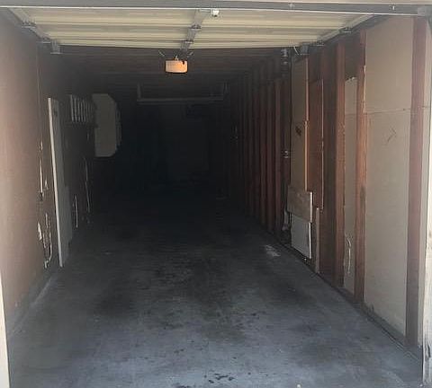 2 car private garage (tandem) with extra storage area. Garage goes very deep