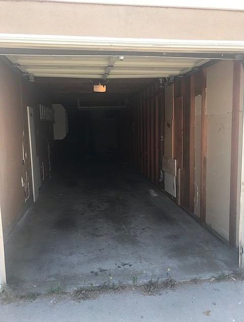 2 car private garage (tandem) with extra storage area. Garage goes very deep