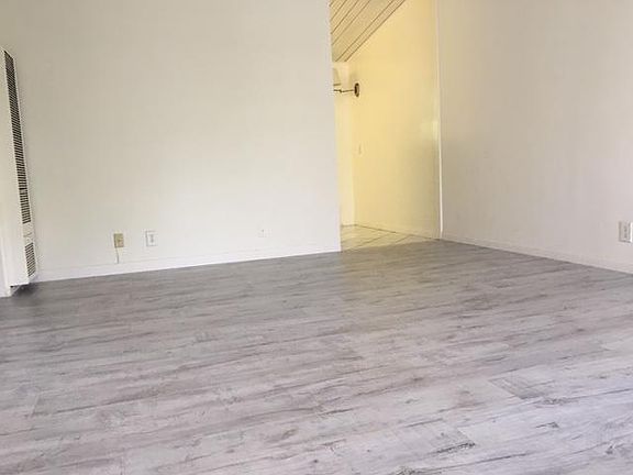 Large living room.... check out the fabulous new wood flooring!