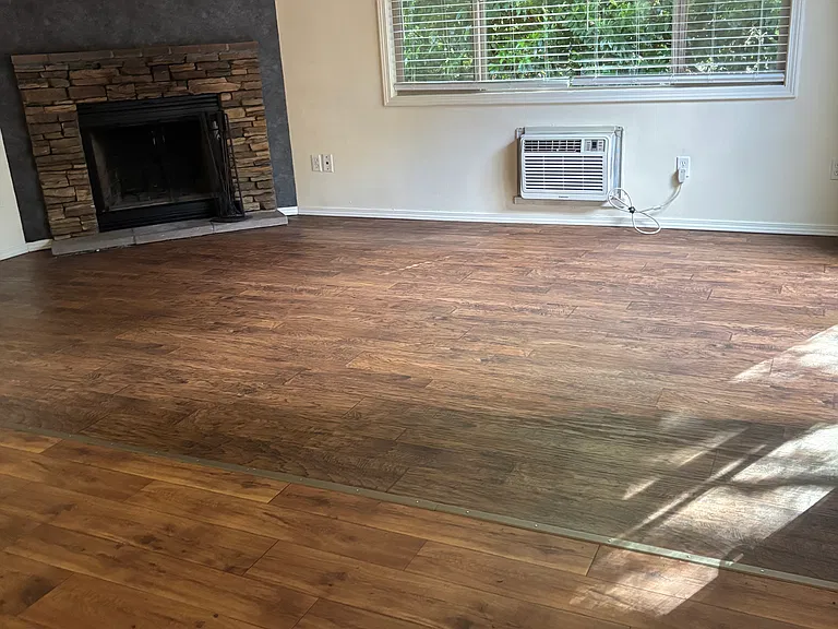 Living room with corner fireplace