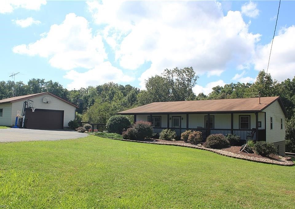 Lovely home on an acre! Oversized double garage.