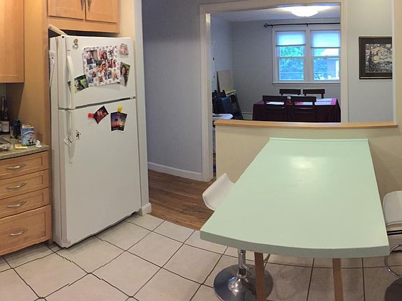 Open kitchen layout looking into dining room.