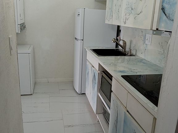 4th image of 5055 NW 7th St APT 1004