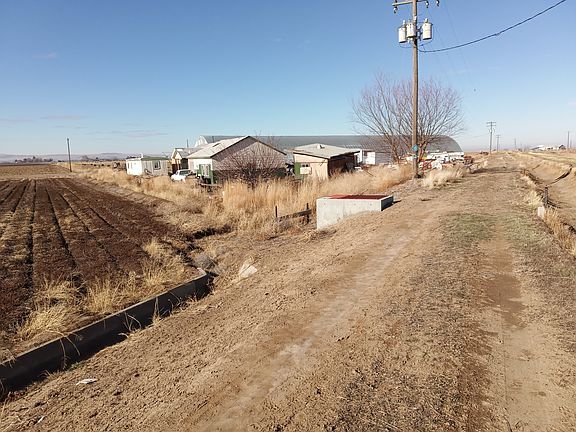 Shop beyond house and storage