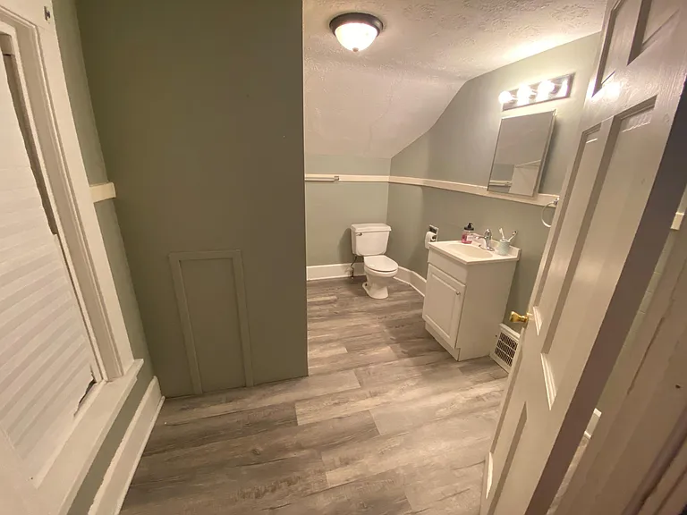 Upstairs bathroom. No sink.