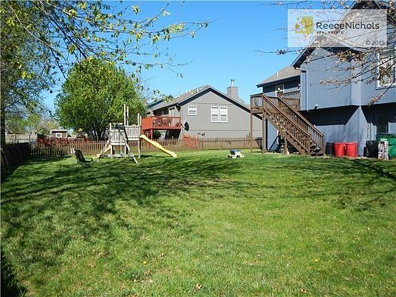 Large Fenced, Treed Yard.  Garage has access to yard.