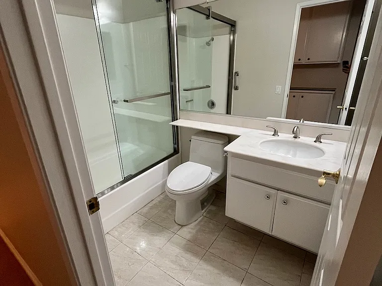 upstairs bathroom (downstairs is same with wood tone laminate floor)