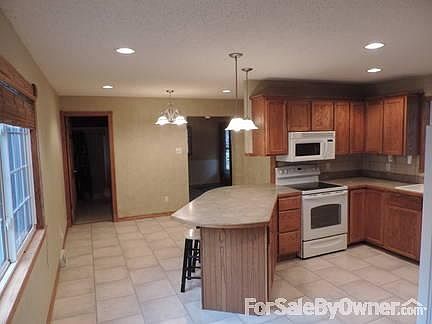 Kitchen
						:
						15ftx19ft remodeled 2004, stove, refrig., microwave, garbage disposal included.