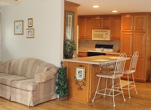 Gleaming kitchen cabinets, ...