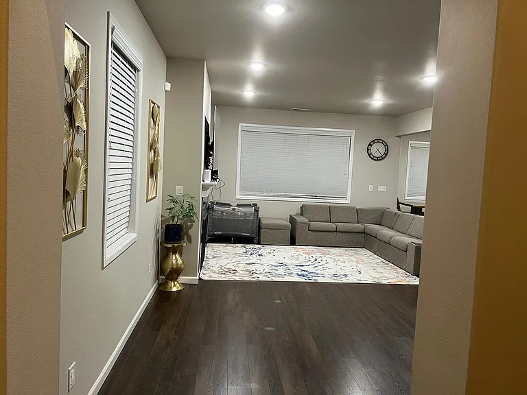 Main Floor , Bright & Spacious EntrywayLiving Room with Abundant Natural Light
Modern Gourmet Kitchen
Large Kitchen Island with Seating
Stainless Steel Appliances & Ample Cabinet Space
Dining Area Overlooking the Backyard