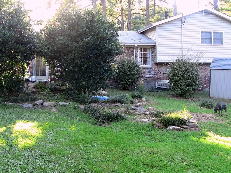 Huge back yard with 6 foot privacy fence.