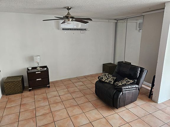 This is where the sleeping area is with an extra closet. Currently no bed in unit but if the renter wants one we will place a queen sized bed. We do not have it in the unit due to many renters owning their own furniture and beds in past rental experiences
