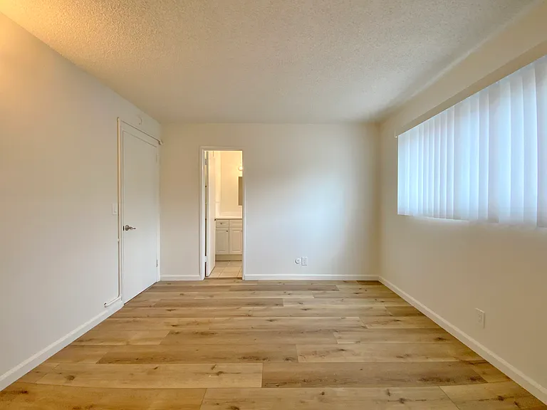 Bedroom; Photos of a similar unit. Available unit has luxury vinyl "wood" plank flooring throughout except in the bedroom (high grade Berber carpet).